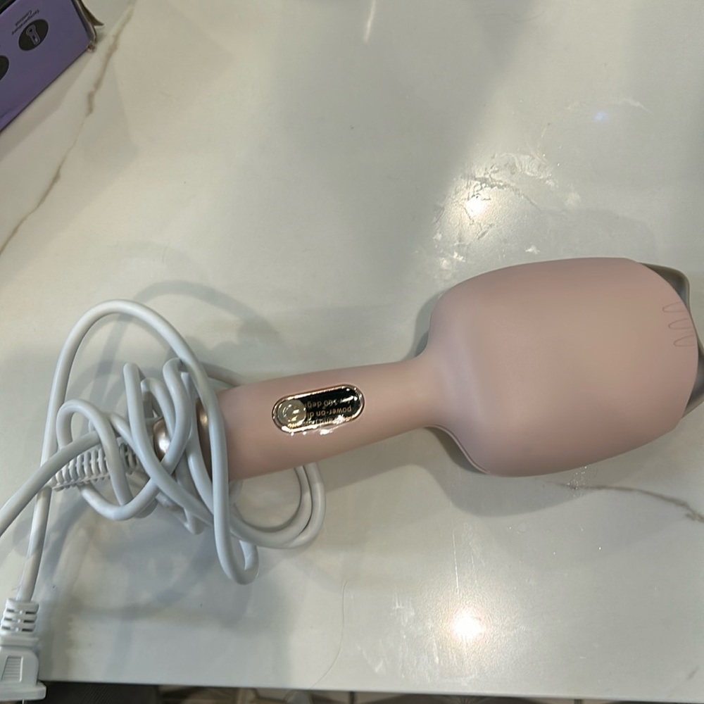 Portable pink hair curler